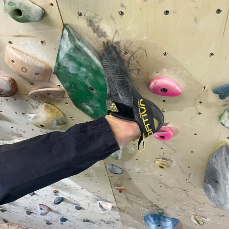 Close-up of La Sportiva Ondra Comp shoe climbing in a gym.
