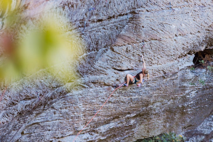 Emily Harrington climbing a steep wall at The Venue, Red River Gorge
