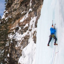 The author leads a steep ice pitch in British Columbia wearing Camp's Alpinist Tech crampons.