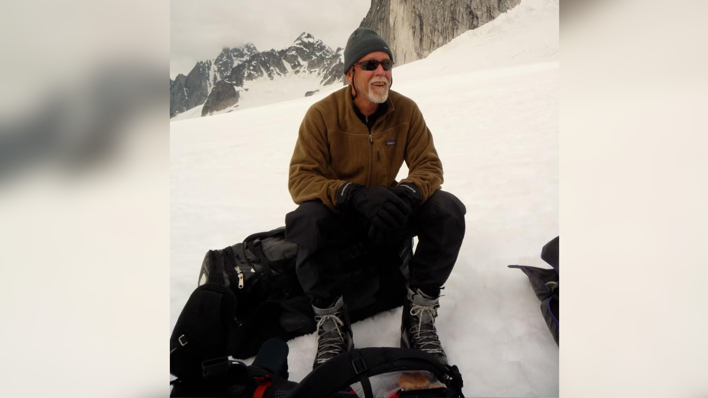 James "Jim" Pinter-Lucke, seen here sitting on a bag on a glacier in winter gear, died on September 17, 2025