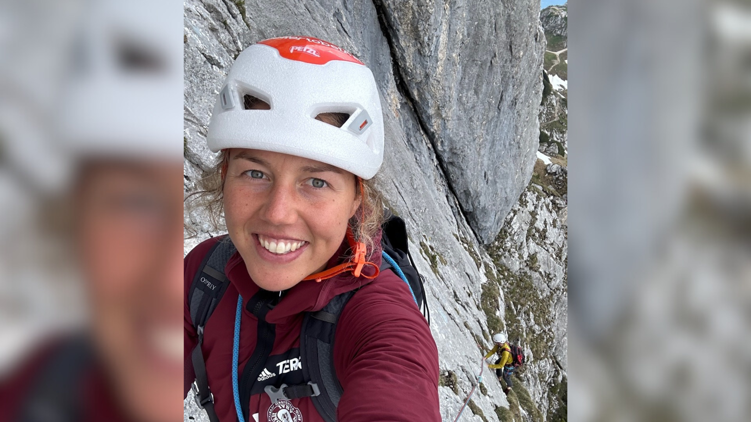 Climber Laura Dahlmeier, seen here in a selfie climbing in white and red helmet with climber below her, died on July 28, 2025