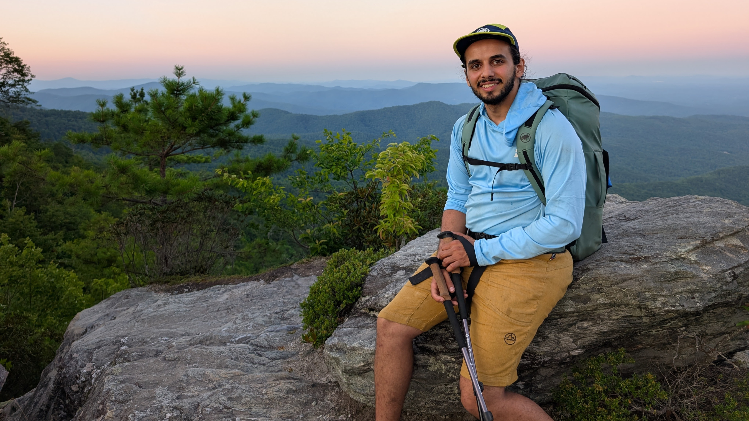 Yoseph Alabdulwahab, seen her sitting on a rock with a backpack and hiking poles in front of a sunset, died on July 6, 2025