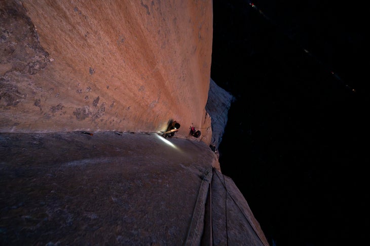 a climber in a corner at night