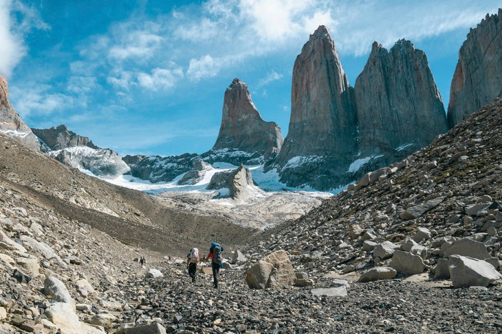 Tommy Caldwell and Siebe Vanhee approach the mountains en route to the first one day ascent, in Patagonia, of the Central Tower of Paine.