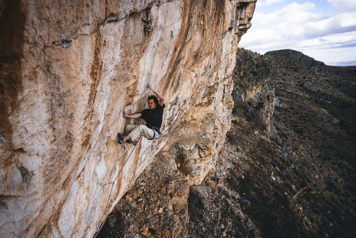 Sean Bailey makes the first ascent of 'Duality of Man' (5.15d) in Dry Canyon, Arizona.