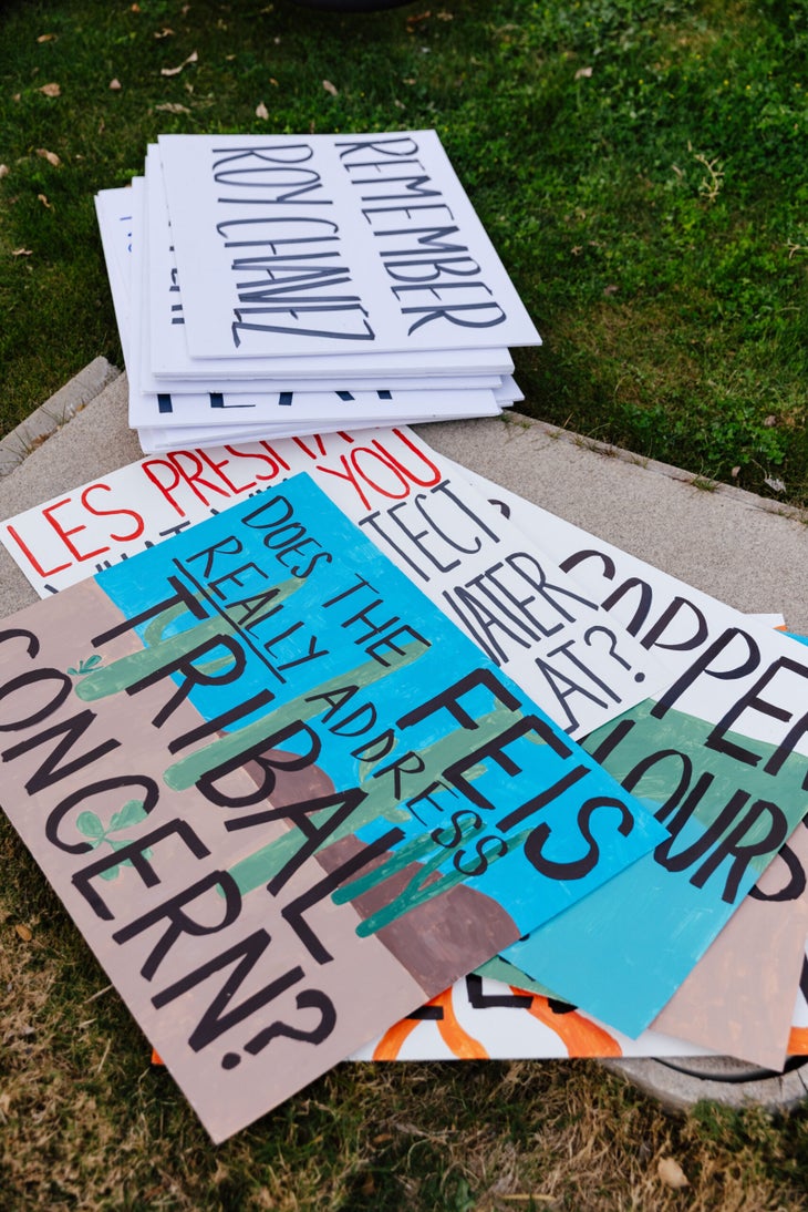 A stack of protest signs from the January 28, 2026 demonstration in Phoenix against Resolution Copper