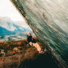 Brooke Raboutou won a 2025 Golden Piton award for her ascent of Excalibur. Here she hangs from a bolt while working the project.