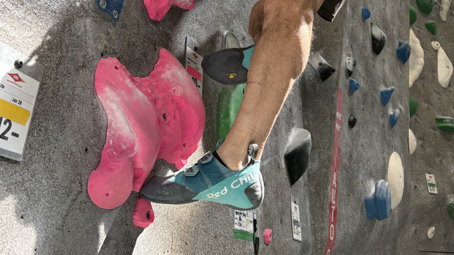 Matt Samet tests the Red Chili Voltage 3 on an indoor bouldering wall, demonstrating why they are our pick for the best climbing shoes for all-around performance.