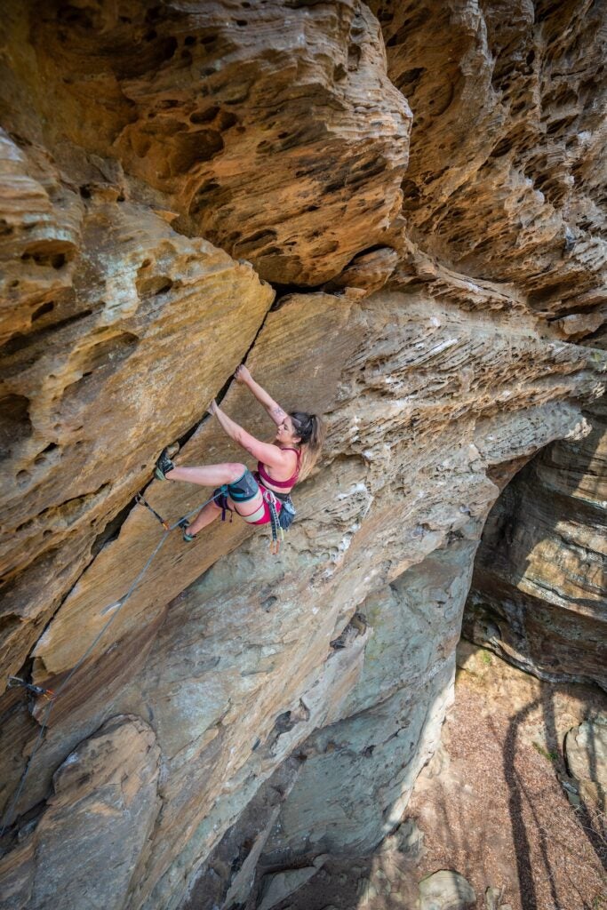 a climber on Opening Act at Arena
