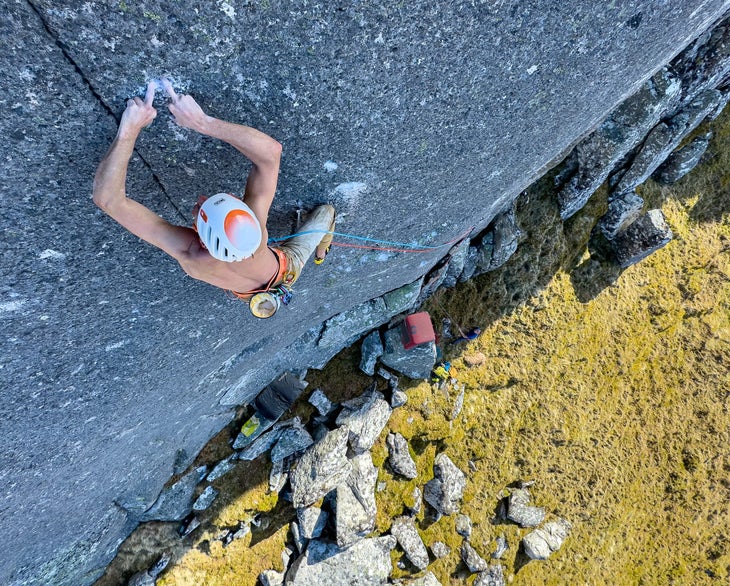 Man climbs with only his middle fingers on the world's scariest trad route.