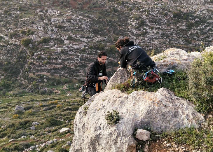 Two Palestinian climbers bolt a new route in the West Bank.