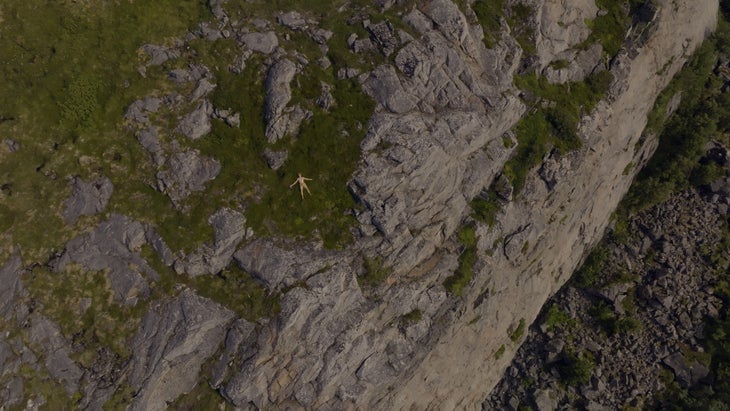 Leo Bøe basks in clear skies after redpointing Verdens Ende, the longest 5.15a in Norway.