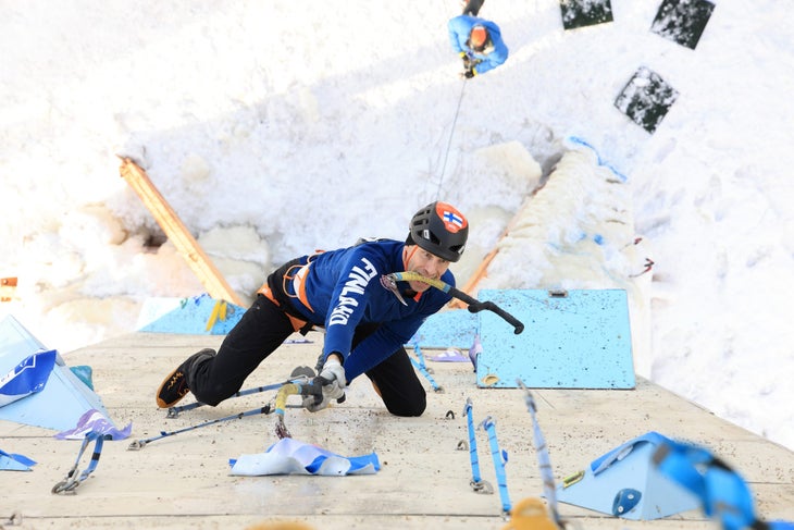 ice climbing at the 2030 olympics? France says no. Here, an ice climber competes in Lead.
