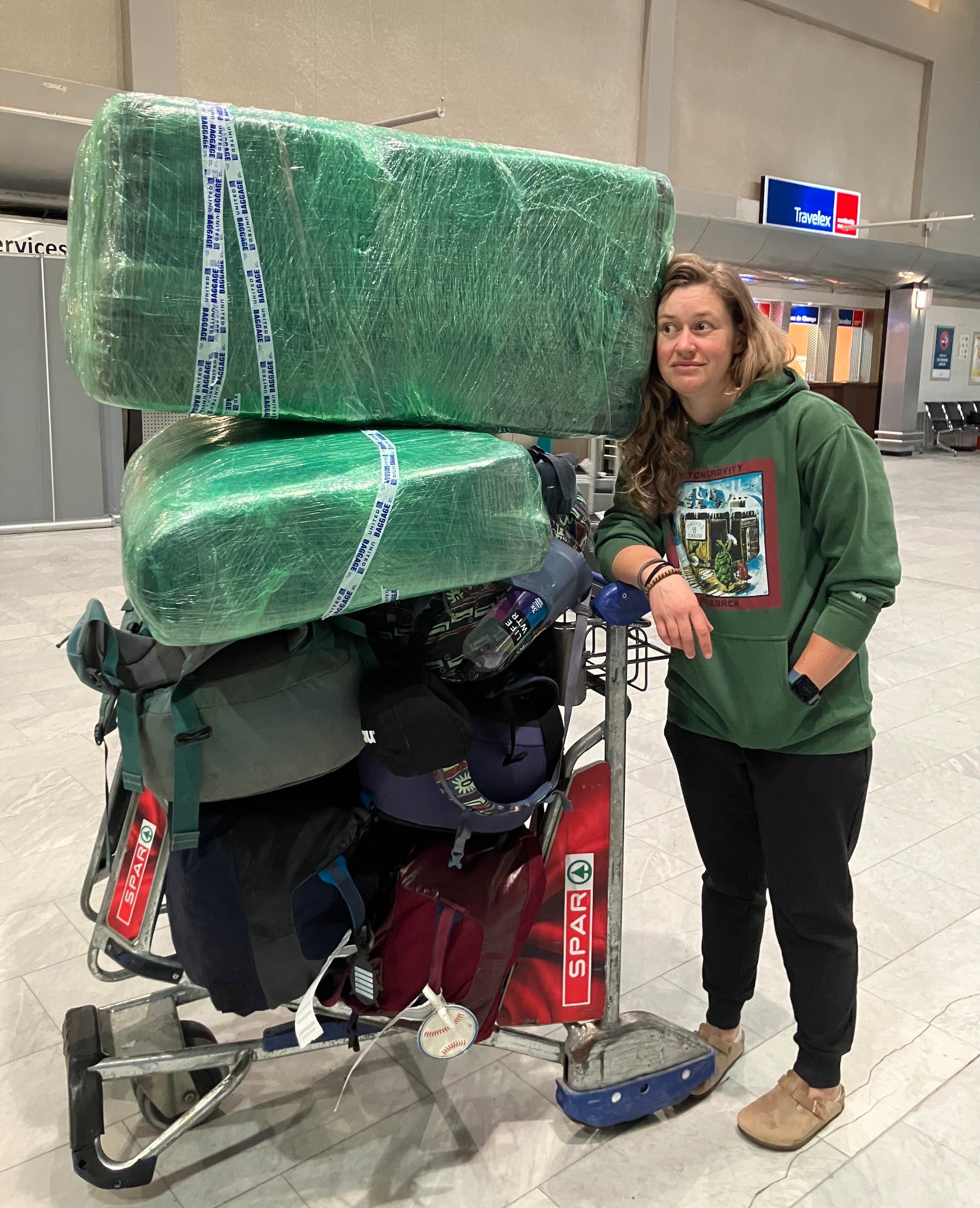 climber with bags at airport