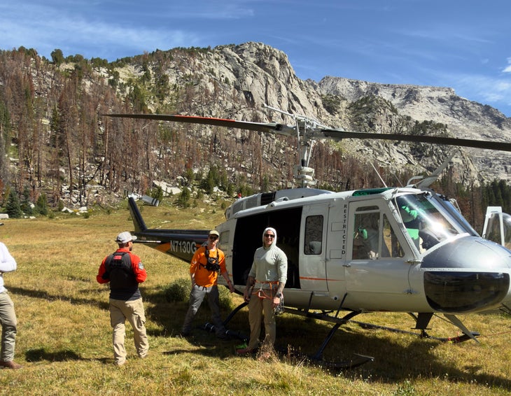 Martin (right) with the helicopter in the Cirque of the Towers responding to the stuck climbers.