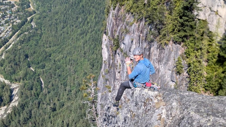 Matthew Clark poses atop a cliff in Squamish, British Columbia, a few years before his rescue
