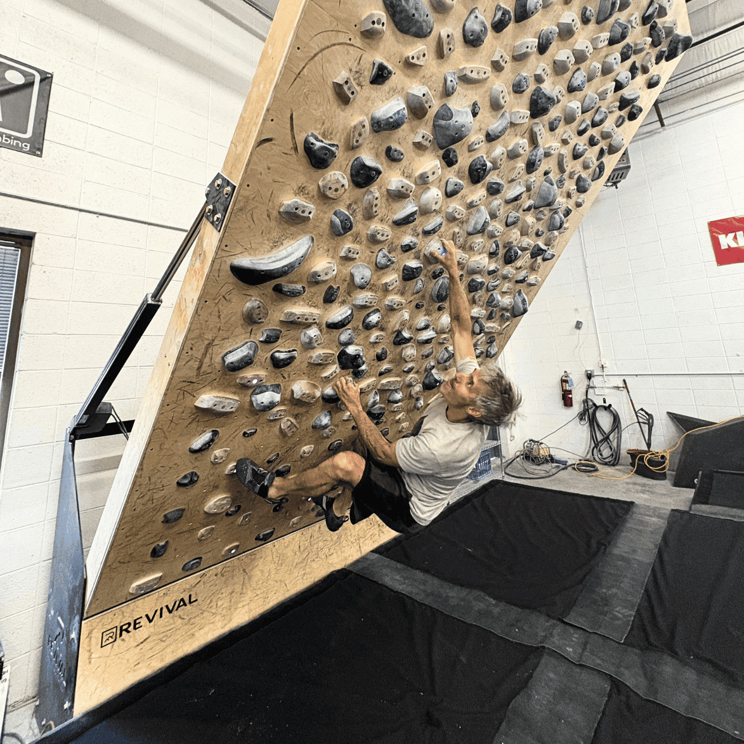 Dialing into steep footwork on the Tension Board 2 at The Campus Climbing and Training Center, Boulder, Colorado, on a V5 @40 degrees. The Blackbird is excellen