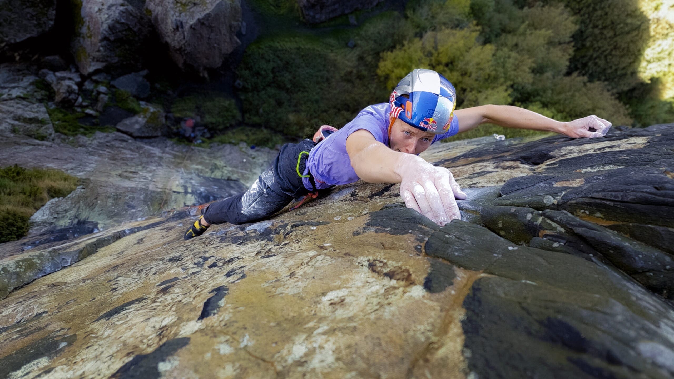 Lara Neumeier climbs one of the hardest sections near the top-out on the route Rhapsody (E11) at Dumbarton Rock, Scotland, on October 7, 2026.