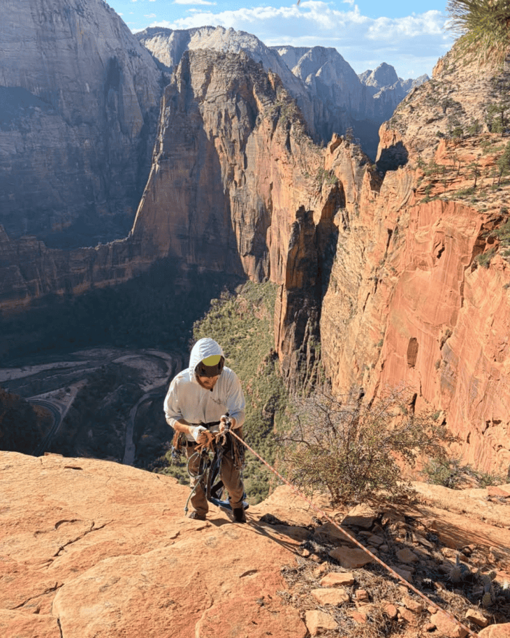 climbs ascends fixed rope